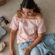 Pastel Pink Off-Shoulder Satin Graphic Tee
